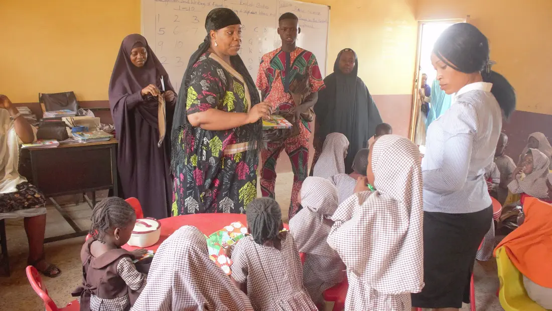 Meeting with women and families